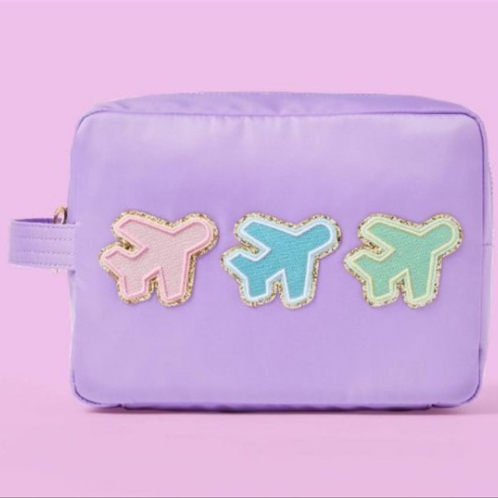 Stoney clover x Target purple large airplane pouch. NWT